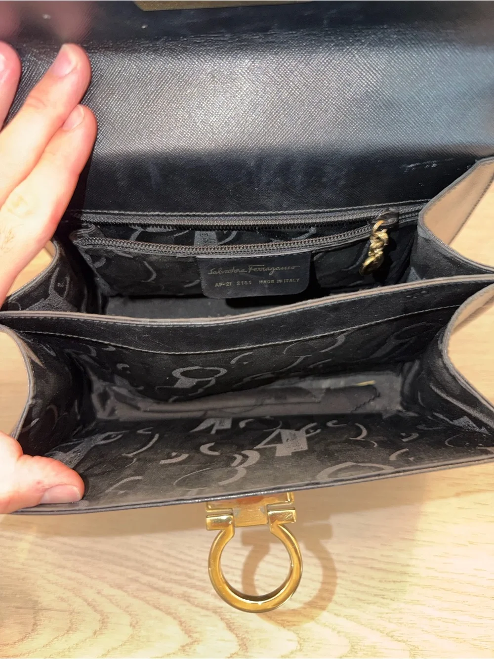 Vintage Salvatore Ferragamo Black Top-Handle Bag with Gold Gancini Closure